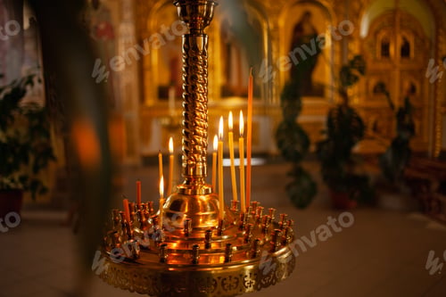 Preview: Candlestick. Candles in the church, church candle stand. Candles are burning