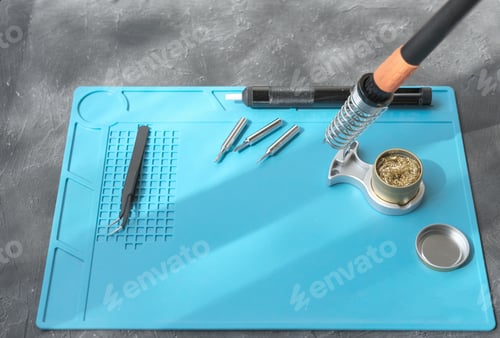 Preview: portable electric soldering iron and computer curcuits.