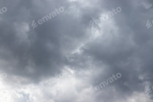 Preview: Beautiful view of thick, dark rain clouds in the sky