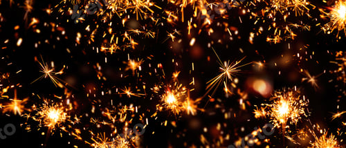Preview: celebration sparks on black background