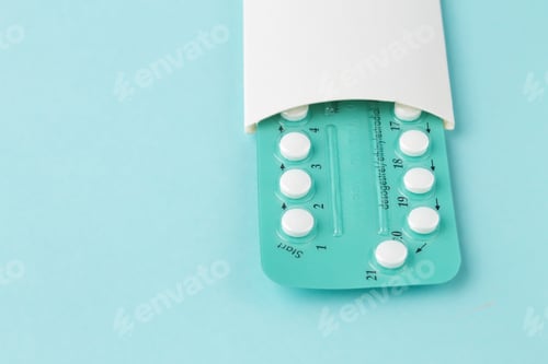 Preview: Pack of oral contraceptive pills with instructions. Blister in white case on blue background