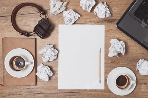 Preview: Creative crisis concept. Crumpled paper and empty drinked coffee cups with blank paper
