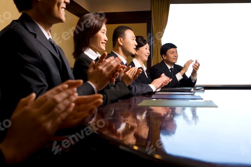 Preview: Business professionals applauding