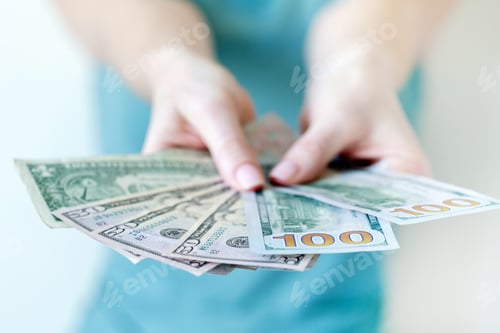 Preview: American dollars in hands. Hundred and fifty dollar bills.