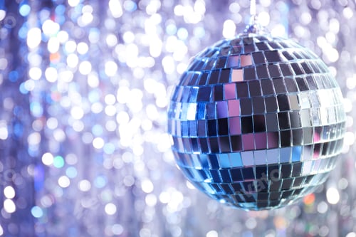 Preview: Disco ball with festive silver ribbons on background