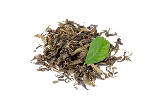 Preview: Dried green tea on the white background