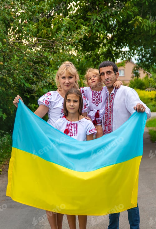 Preview: Family Ukrainians in vyshyvanka patriots. Selective focus.