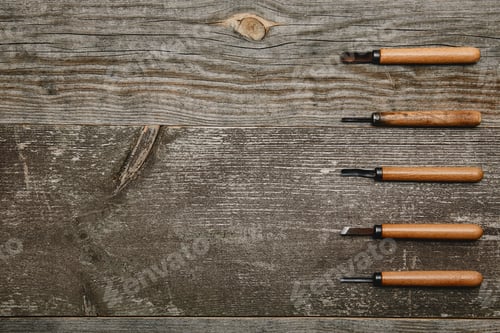 Preview: Top view of five carpentry files tools on wooden background