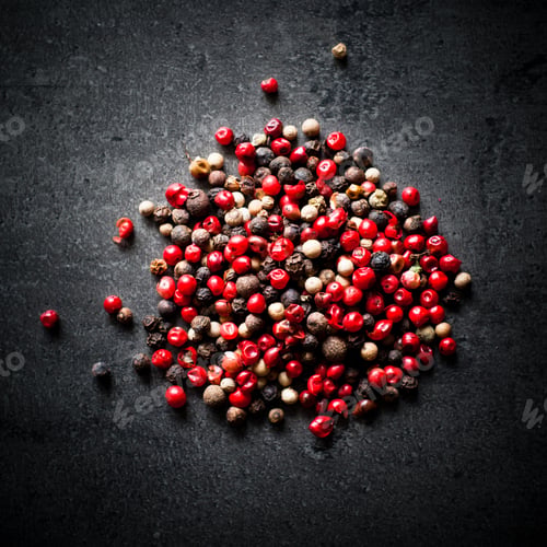 Preview: Peppercorns on a dark background