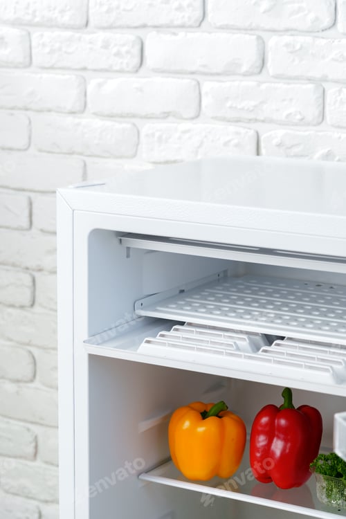 Preview: Open Refrigerator Door Showing Fresh Produce Inside