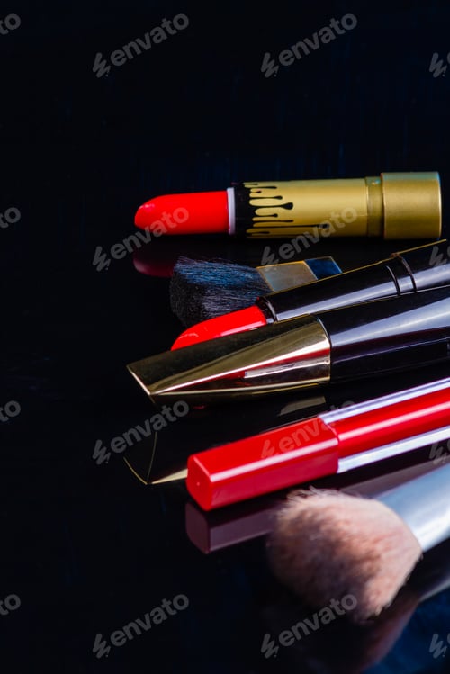 Preview: Vertical shot of various make up accessories.