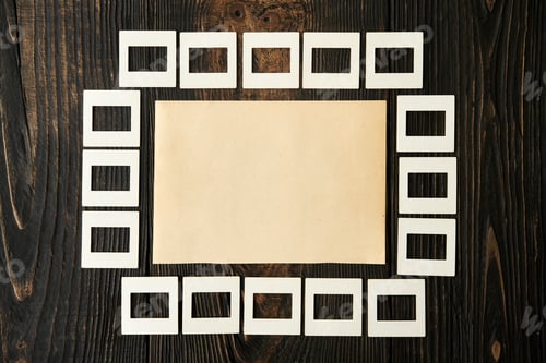 Preview: Blank craft paper mock-up with copy space on dark wooden background.