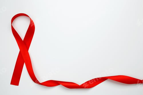 Preview: Red ribbon with awareness about AIDS on a white background. World AIDS Day