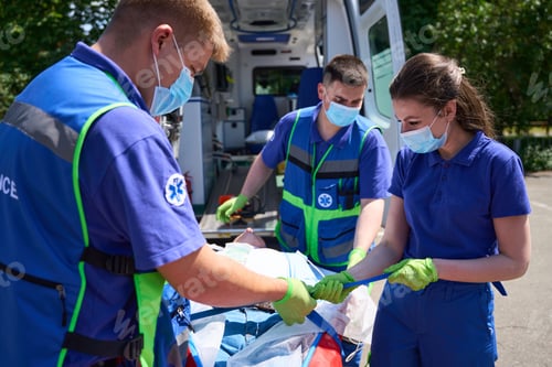 Preview: Paramedics fix the patient for transportation