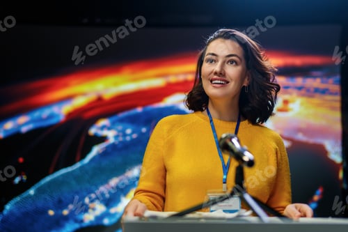 Preview: woman is giving a presentation at conference