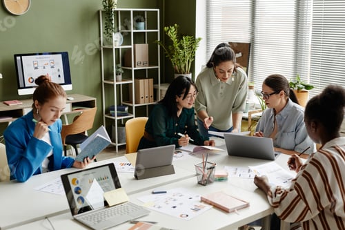 Preview: Female colleagues working in team