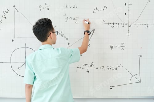 Preview: Schoolboy writing geometry equation