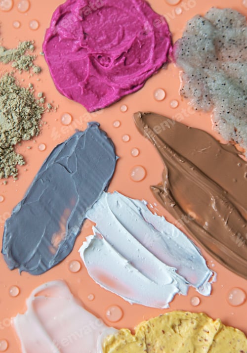 Preview: Different smears of cosmetics. Selective focus. Wet.