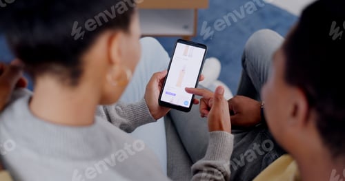 Preview: Overhead, phone and online shopping with a couple on a sofa, sitting in the living room of their ho