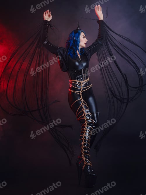 Preview: happy halloween, woman in devil costume