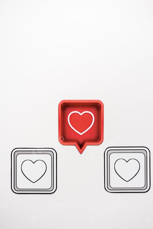 Preview: top view of red speech bubble with heart near black cubes isolated on white