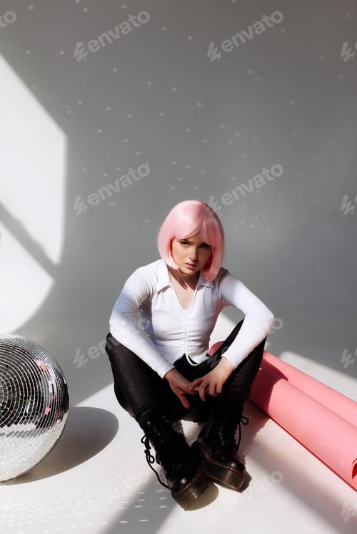 Preview: Contemporary Pink-Haired Woman in Minimalist Studio