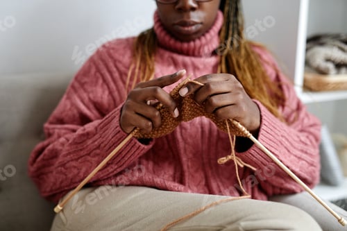 Preview: Young Woman Knitting at Home Close Up