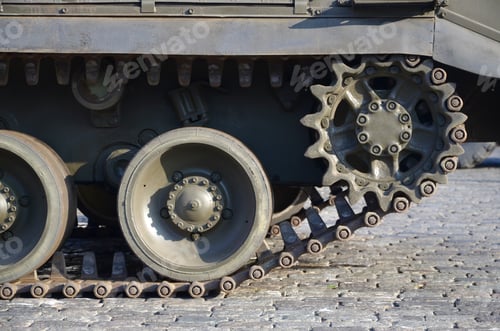 Preview: Close up of green armoured caterpillar transport