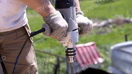 Preview: Close-up of electric drills for drilling timber. Clip. Large electronic drill for drilling holes in