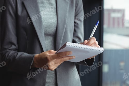 Preview: Counselor at office taking notes