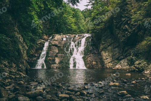 Preview: Waterfall in the mountains.