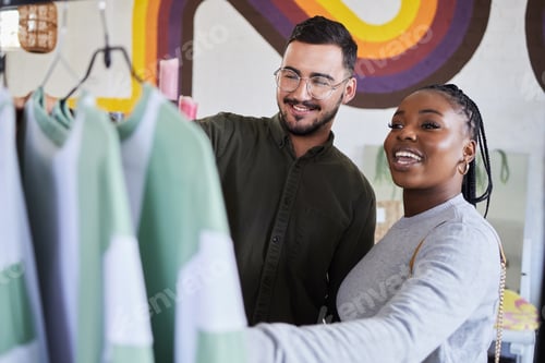 Preview: Retail, store and interracial couple shopping for fashion or style together in a mall and happy for
