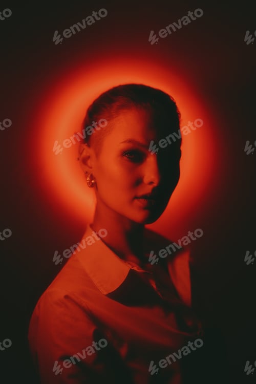 Preview: Young woman portrait on neon background