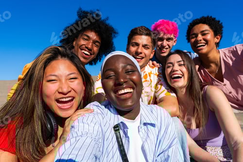 Preview: Multiethnic group of young happy friends hanging out