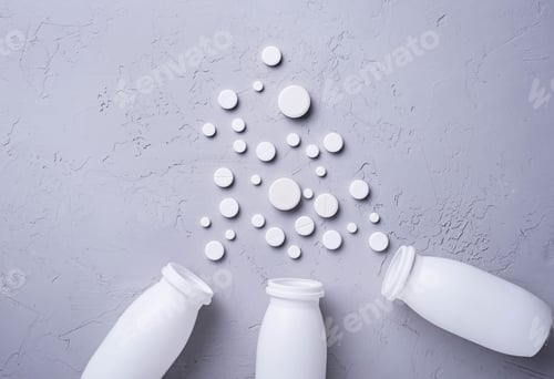 Preview: Different pills and tablets on grey background