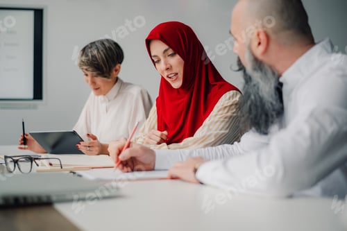 Preview: Business people collaborating during meeting in office boardroom
