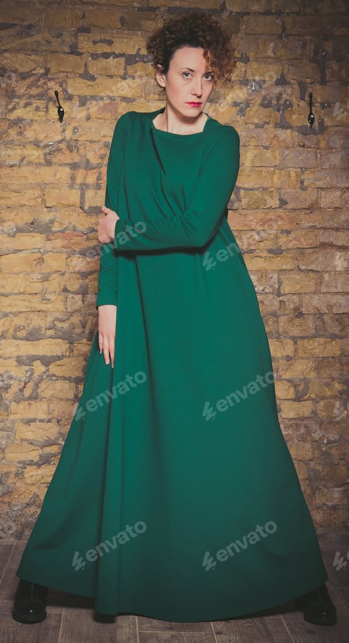 Preview: Girl Posing In A Green Dress.