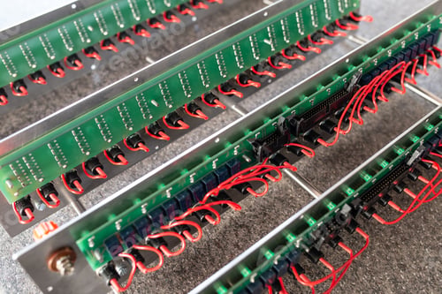Preview: Close-up of a metal panel with microchips