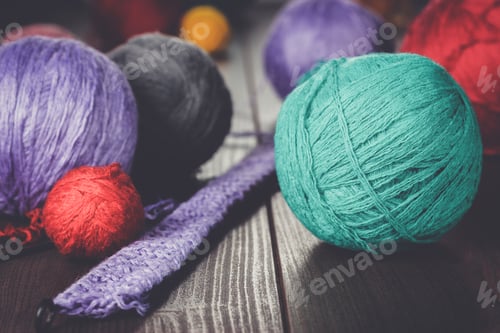 Preview: knitting needles and balls of threads