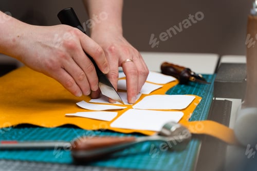 Preview: Knife and template used by artisan to cut premium leather precisely