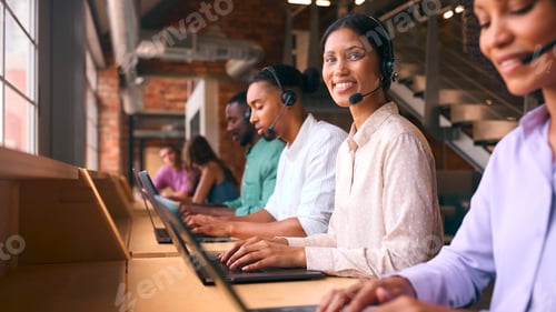 Preview: Portrait Of Customer Support Or Telesales Team In Modern Open Plan Office Wearing Headsets