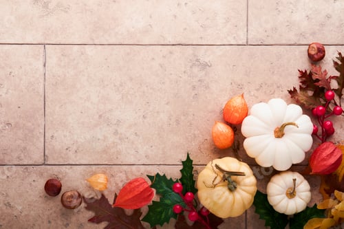 Preview: Halloween festive autumn background. Autumn decor from pumpkins, berries, maple leaves and chestnuts