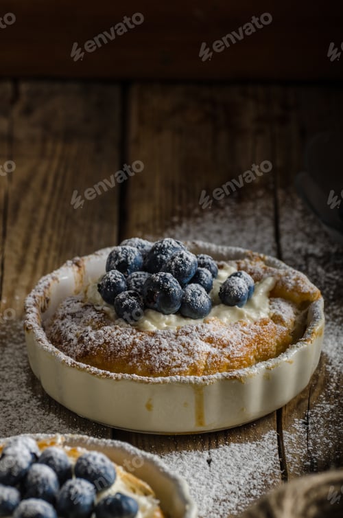Delicious Blueberry Dessert Topped with Powdered Sugar