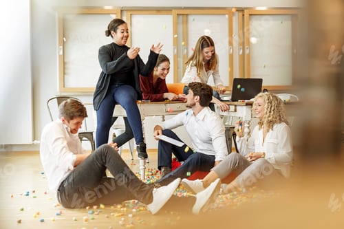 Preview: Playful creative professionals meeting in office