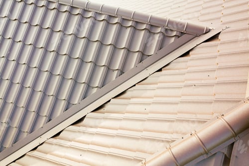 Preview: House roof surface covered with brown metal tile sheets