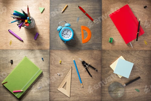 Preview: school supplies at wooden background