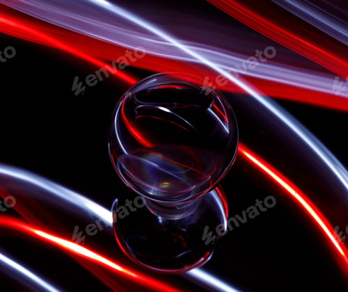 Preview: Intriguing red light emanating from a light bulb in a dimly lit setting