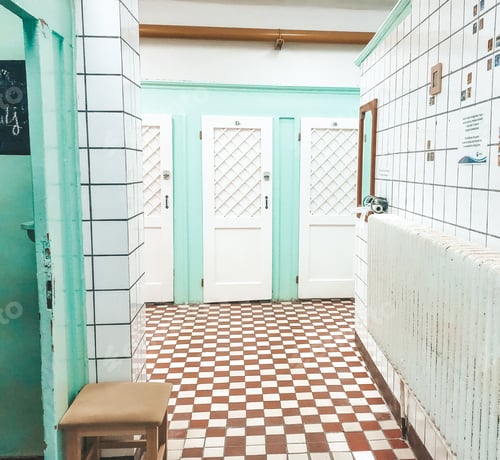 Preview: Tiles floor and light green walls changing rooms in the Soviet style baths