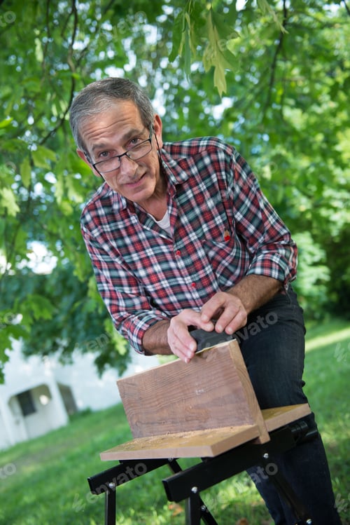 Preview: Using A Sanding Block On The Edge Of A Board Outdoor