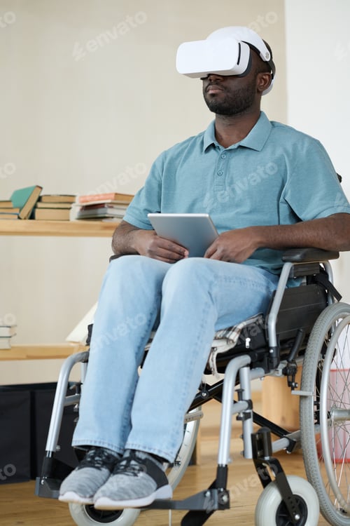 Preview: Disabled man having virtual reality therapy